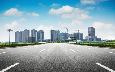 Asphalt road and modern city Asphalt road and modern city